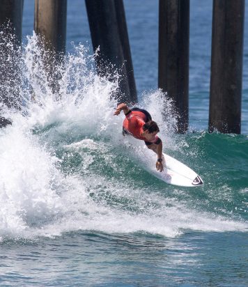 HUNTINGTON BEACH, CALIFORNIA, UNITED STATES - JULY 30: Lucca Mesinas of Peru surfs in Heat 9 of the Round of 96 at the VANS US Open of Surfing on July 30, 2022 at Huntington Beach, California, United States. (Photo by Kenny Morris/World Surf League)
